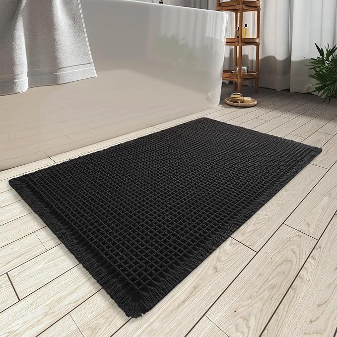 AMOAMI Upgraded Waffle Bath Mat, Super Absorbent Non Slip Bath Mats for Bathroom Floor, Machine Washable Bathroom Rugs with Tassels, Rubber Backed Bathroom Mats, Ultra Soft, 17" x 24", Black